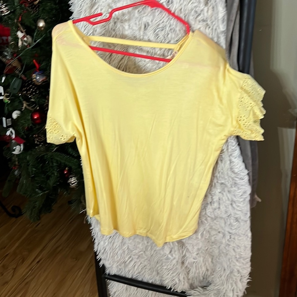 Yellow shirt with lace sleeves and strap on back